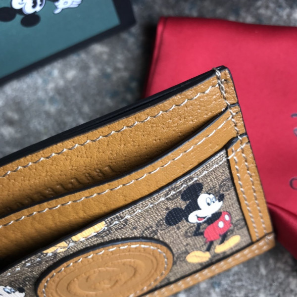 disney x G*u*i gg card holder