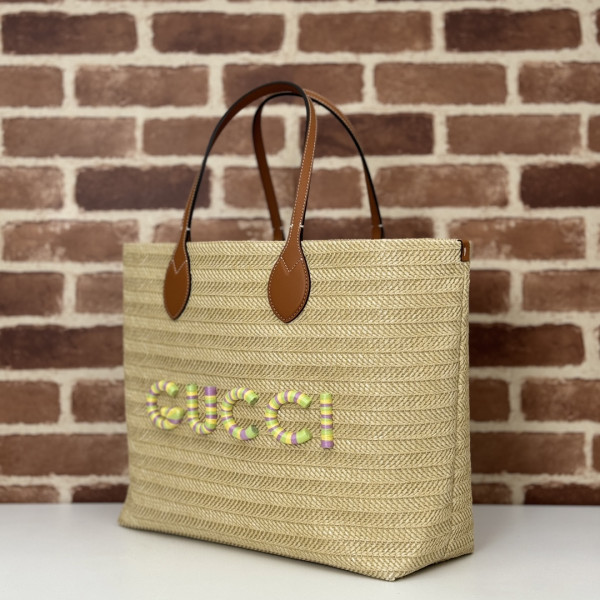 G*u*i medium straw-effect tote
