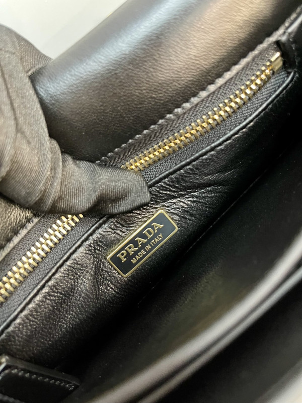 Pra*a soft sound small leather shoulder bag with charms