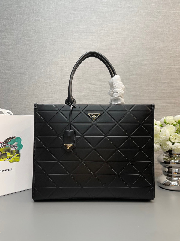 Pra*a symbole large leather bag $ 4,200