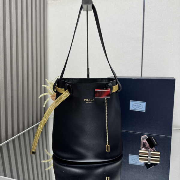 Pra*a buckle leather bucket bag with jeweled belt